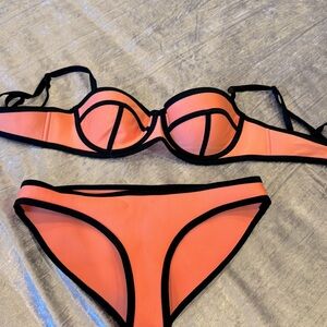 Orange swimsuit. Size S can be xs